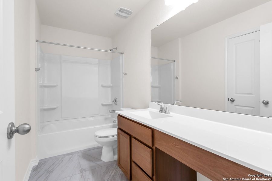 Furnished interior view inside a new home in Spanish Trails, San Antonio (Image 5).