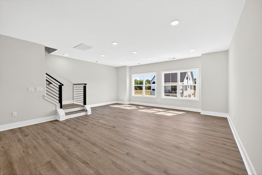 Representative unfurnished interior of a home built from the Atlas Interior Unit by Baker Residential in Atwater Station - Midtown Collection, Fuquay Varina (Image 27).
