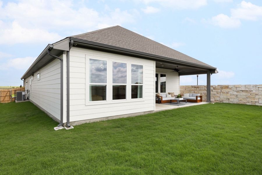 Exterior details and patio area of a home in Turner's Crossing, Buda (Image 24). Exterior details and patio area of a home in Turner's Crossing, Buda (Image 24).