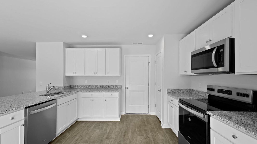 Furnished interior view inside a new home in Center Pointe, Santee (Image 8).