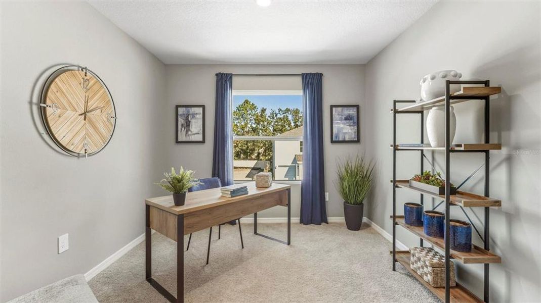 Furnished interior view inside a new home in Oasis at Longwood Run, Sarasota (Image 13).