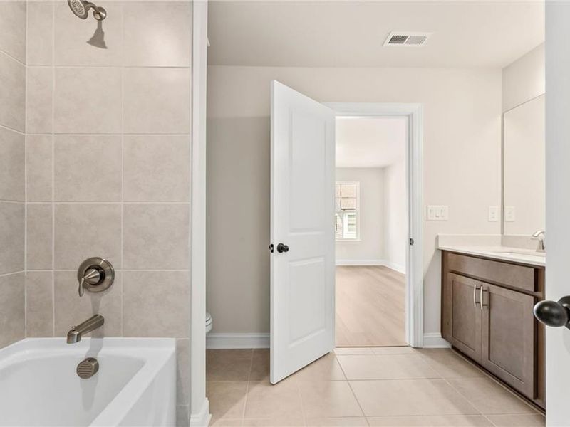 Furnished interior view inside a new home in The Village at Shallowford, Kennesaw (Image 10). Furnished interior view inside a new home in The Village at Shallowford, Kennesaw (Image 10).