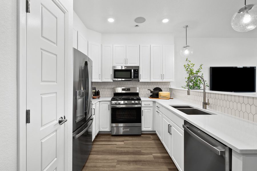 Furnished interior in a model home at Trailstone Townhomes - The Westerly Collection in Arvada (Image 14).