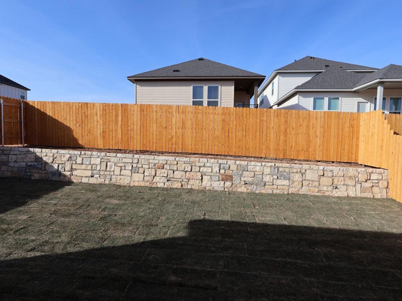 Exterior details and patio area of a home in Heritage, Dripping Springs (Image 3).