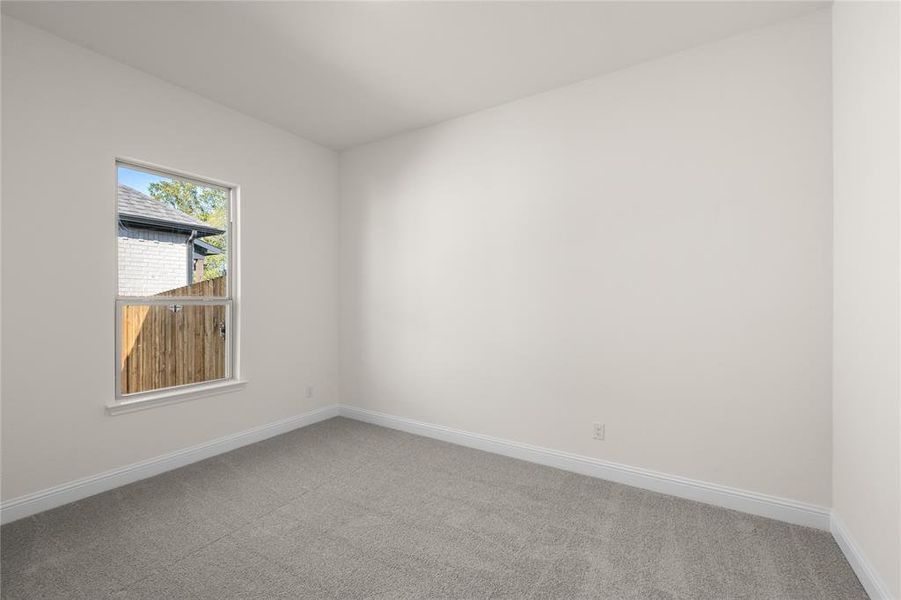 Empty room with carpet floors