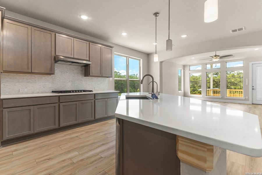 Furnished interior view inside a new home in The Enclave at Potranco Oaks, Castroville (Image 5).