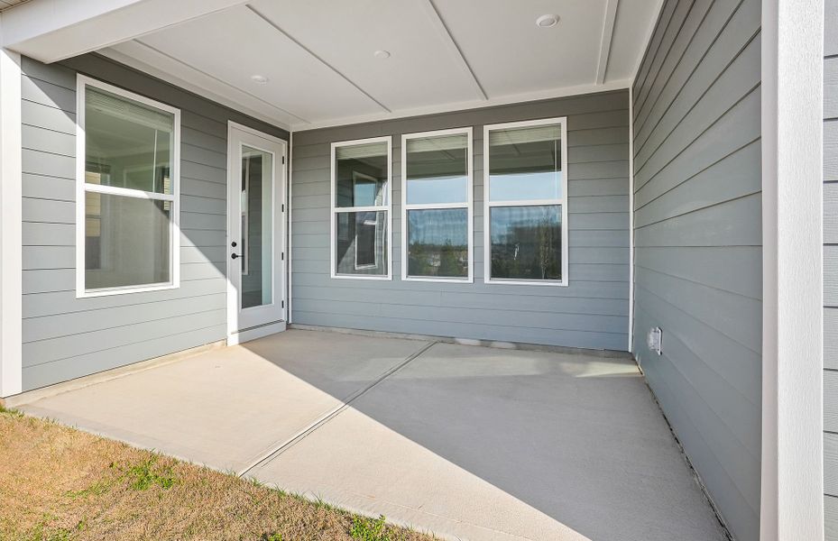 Exterior details and patio area of a home in Carolina Riverside, Belmont (Image 45).