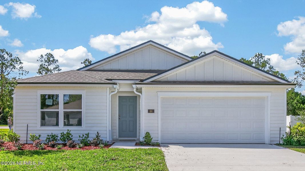 Front exterior of a new home in Palm Coast Homesites, Palm Coast, FL, highlighting curb appeal (Image 1). Front exterior of a new home in Palm Coast Homesites, Palm Coast, FL, highlighting curb appeal (Image 1).