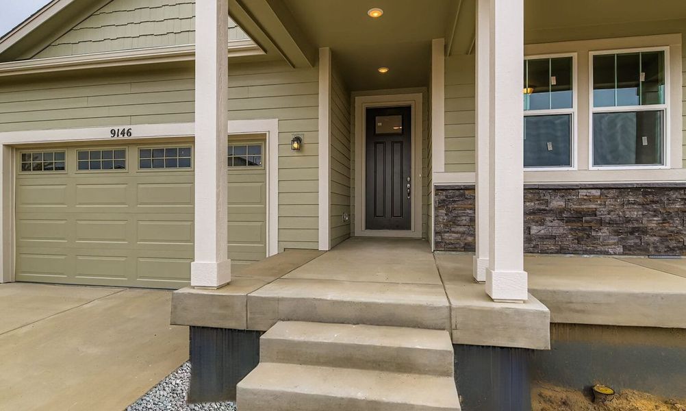 Exterior details and patio area of a home in Buffalo Highlands – Commerce City, Commerce City (Image 3).