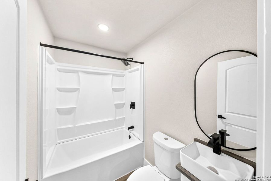 Furnished interior view inside a new home in , Seguin (Image 6).