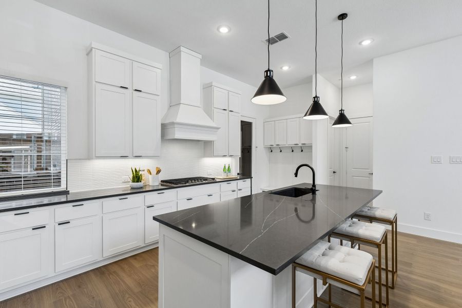 Representative furnished interior of a home built from the Roosevelt by Centre Living Homes in Newman Village Townhomes, Frisco (Image 13).