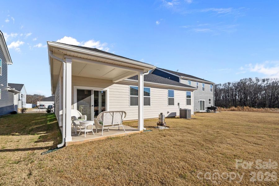 Exterior details and patio area of a home in Sheffield, Indian Trail (Image 30).