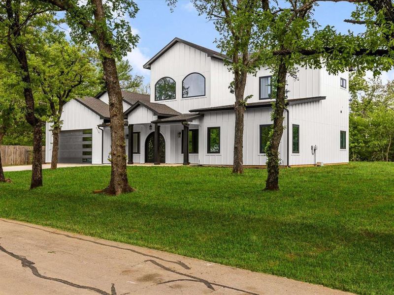 Front exterior of a new home in , Flower Mound, TX, highlighting curb appeal (Image 2). Front exterior of a new home in , Flower Mound, TX, highlighting curb appeal (Image 2).