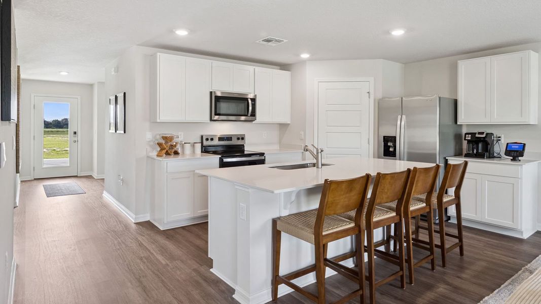 Furnished interior view inside a new home in Leoma's Landing, Lake Wales (Image 9).