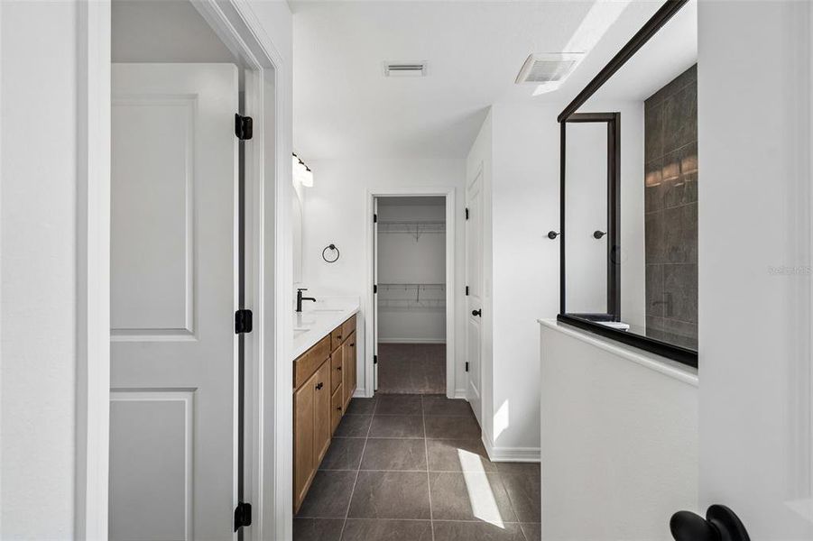 Furnished interior view inside a new home in Avalon West, Spring Hill (Image 18).