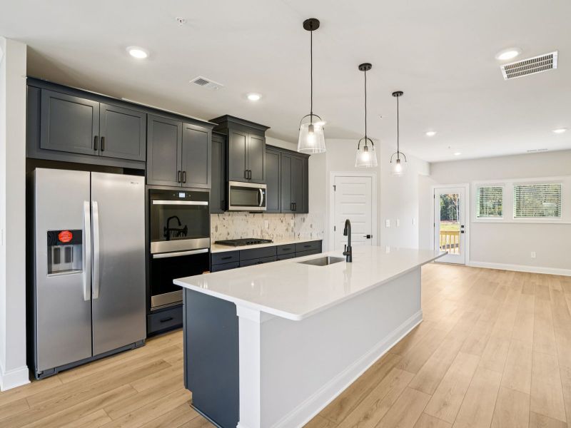 Furnished interior view inside a new home in Hemingway - Highland Series, Cumming (Image 5).