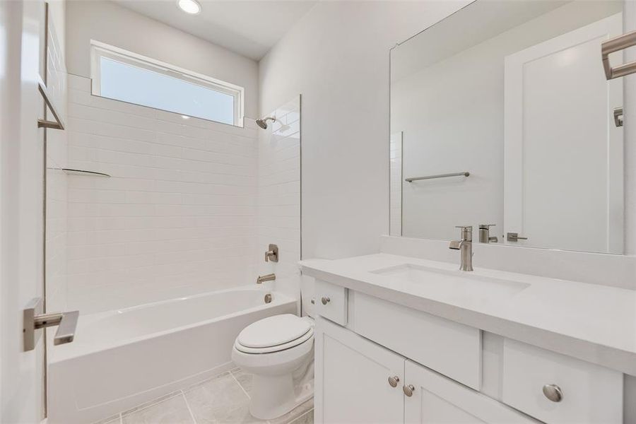 Furnished interior view inside a new home in Collin Creek, Plano (Image 9).