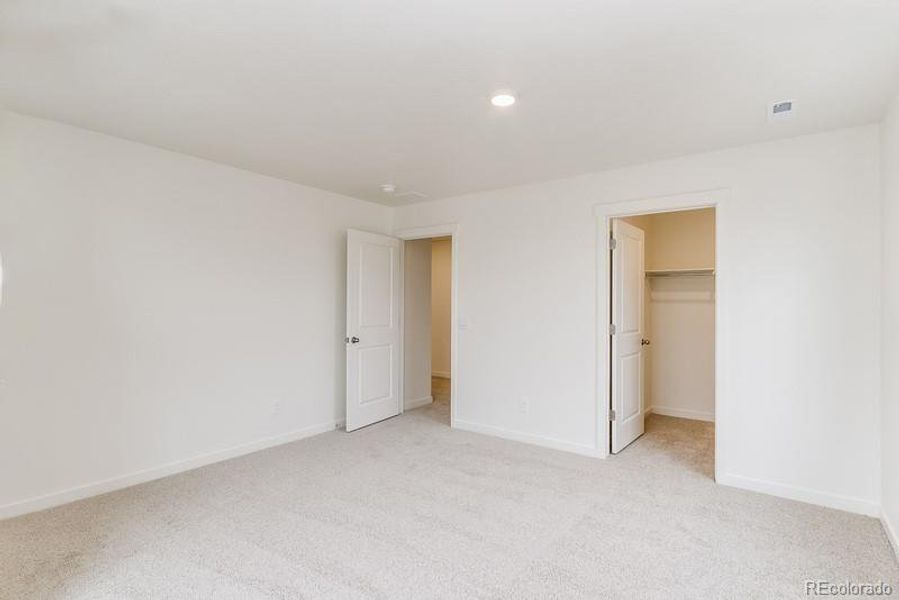 Spacious, unfurnished interior of a new home in Sky Ranch, Watkins (Image 22).