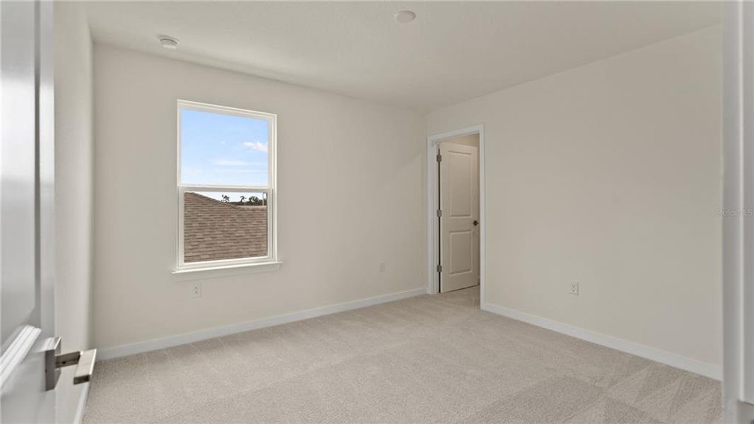 Spacious, unfurnished interior of a new home in Willowbrook North, Winter Haven (Image 33).