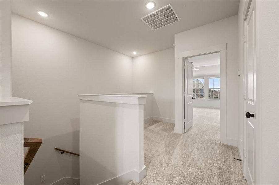 The loft at the top of the stairs makes a perfect pocket office or reading nook. The loft at the top of the stairs makes a perfect pocket office or reading nook.