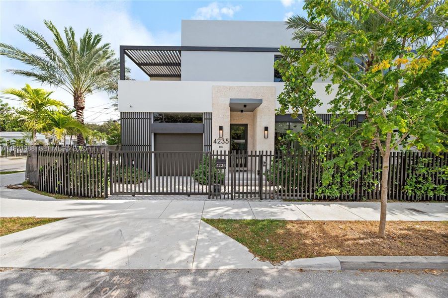 Front exterior of a new home in , Miami, FL, highlighting curb appeal (Image 1).