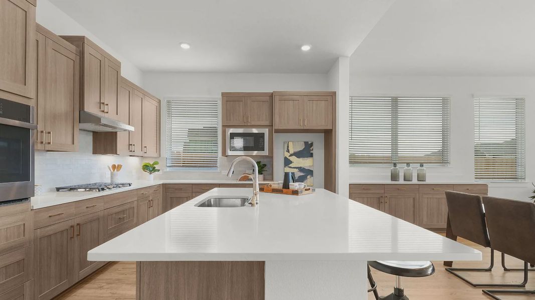 Representative furnished interior of a home built from the Lauren by Chesmar Homes in University Heights, Round Rock (Image 8).