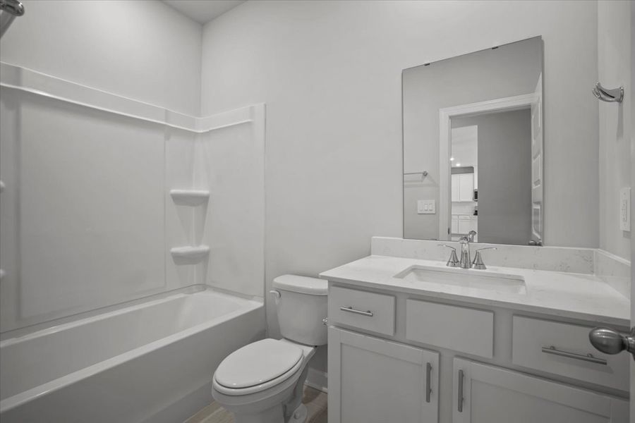 Furnished interior view inside a new home in The Farm at Wells Creek - Signature Collection, Gray Court (Image 10).