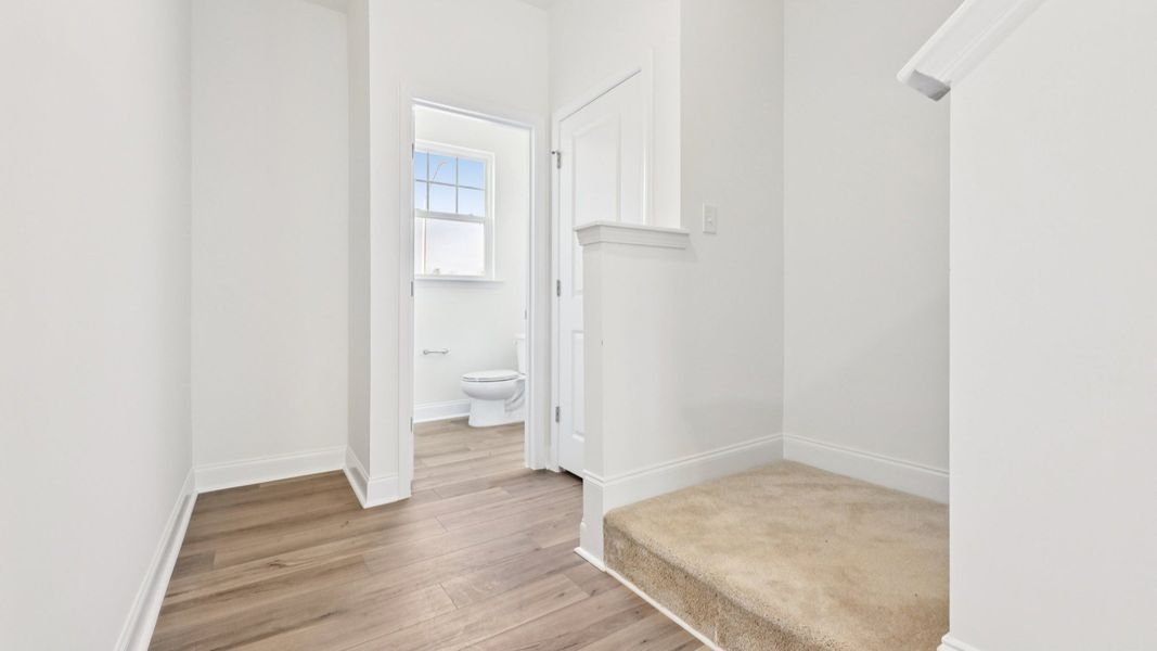 Furnished interior view inside a new home in Battle Bridge, Raleigh (Image 9).