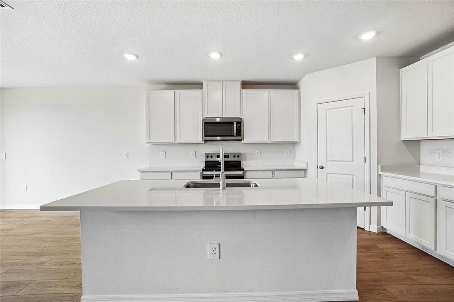 Furnished interior view inside a new home in Pine Ridge Meadows, Hudson (Image 5).