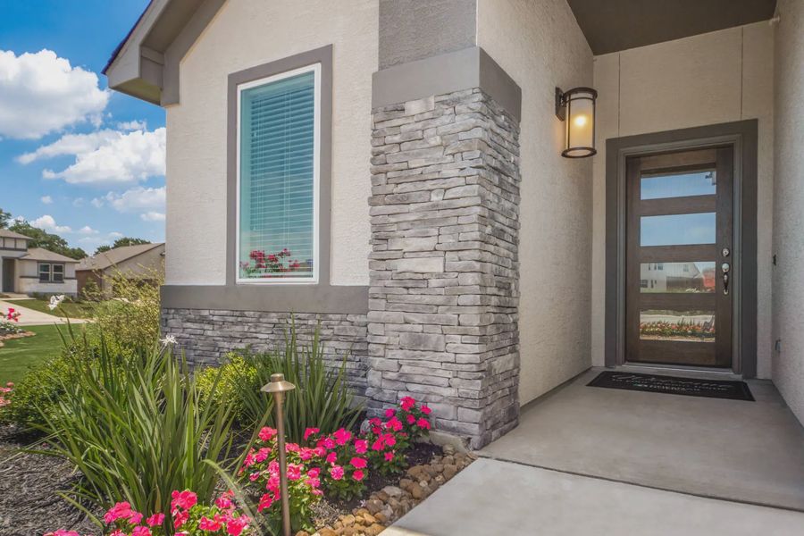 Representative exterior details of a home built from the Charleston by Chesmar Homes in Stillwater Ranch, Buda (Image 4).