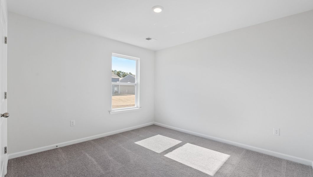 Spacious, unfurnished interior of a new home in Treemont Commons, Wellford (Image 24).