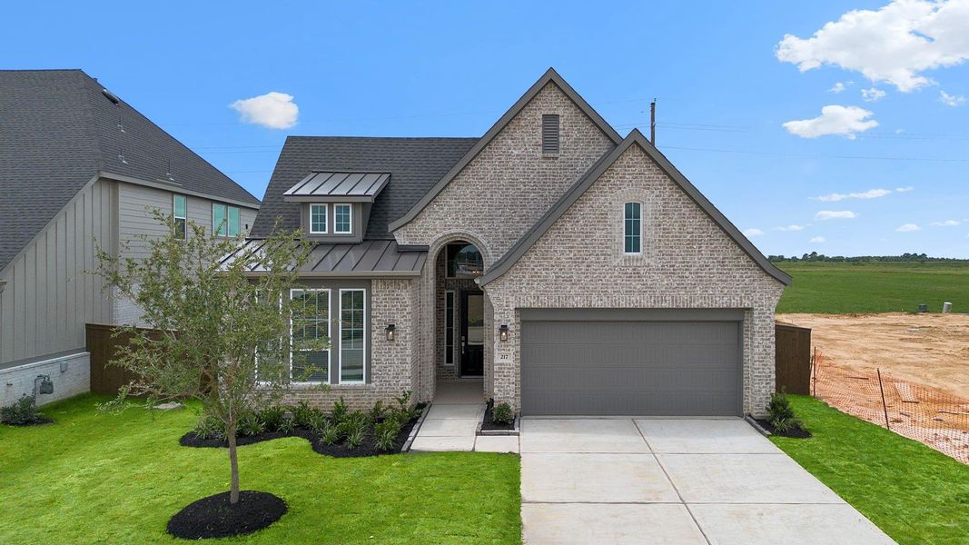 Front exterior of a new home in Attwater, Waller, TX, highlighting curb appeal (Image 23). Front exterior of a new home in Attwater, Waller, TX, highlighting curb appeal (Image 23).
