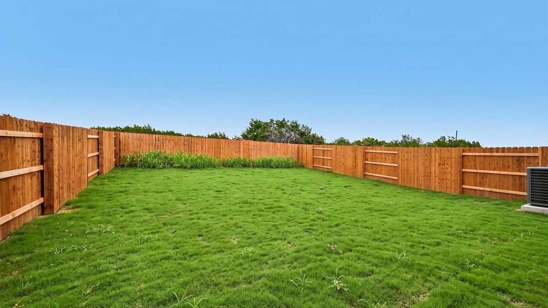 Exterior details and patio area of a home in Bar W Ranch, Leander (Image 24).