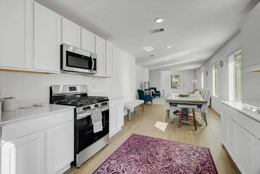 Furnished interior view inside a new home in Pinewood at Grand Texas: Colonial & Cottage Collections, New Caney (Image 17).