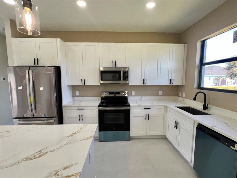 Furnished interior view inside a new home in , Port Charlotte (Image 14).