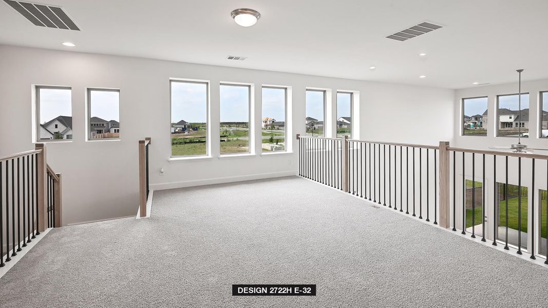 Hall with carpet flooring and recessed lighting