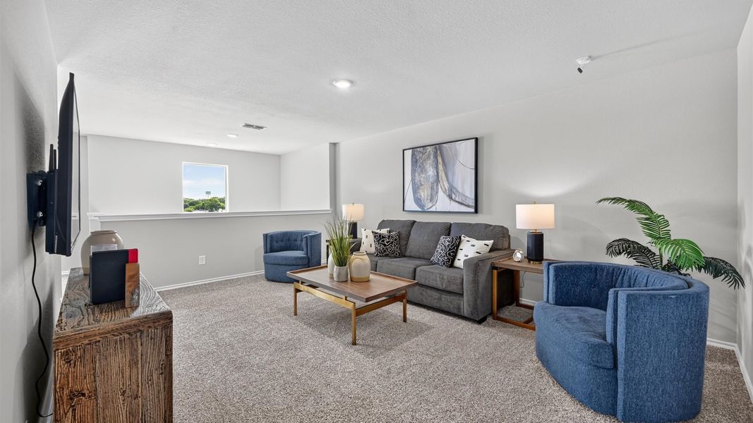 Representative furnished interior of a home built from the Callahan by D.R. Horton in Sunnycreek, Crowley (Image 28).