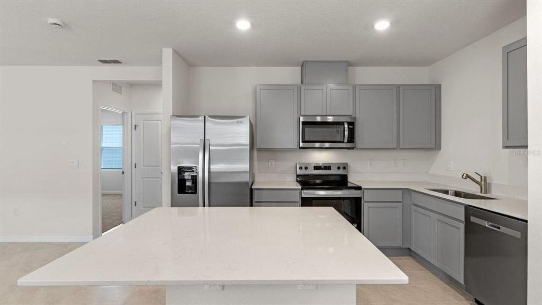 Furnished interior view inside a new home in Magnolia Pointe, Umatilla (Image 3). Furnished interior view inside a new home in Magnolia Pointe, Umatilla (Image 3).