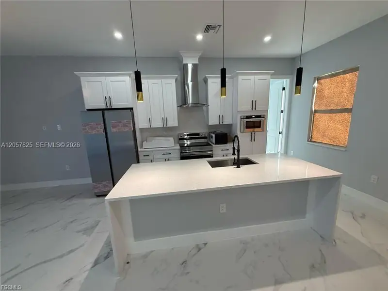 Furnished interior view inside a new home in , Lehigh Acres (Image 10).