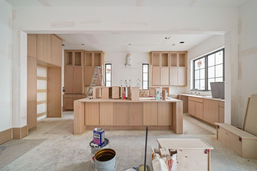 The chef's kitchen offers Thermador appliances and tons of built-ins!