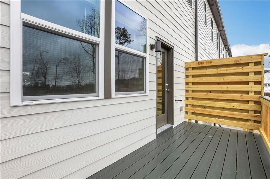 Exterior details and patio area of a home in Towne Village at Suwanee Dam, Sugar Hill (Image 28).