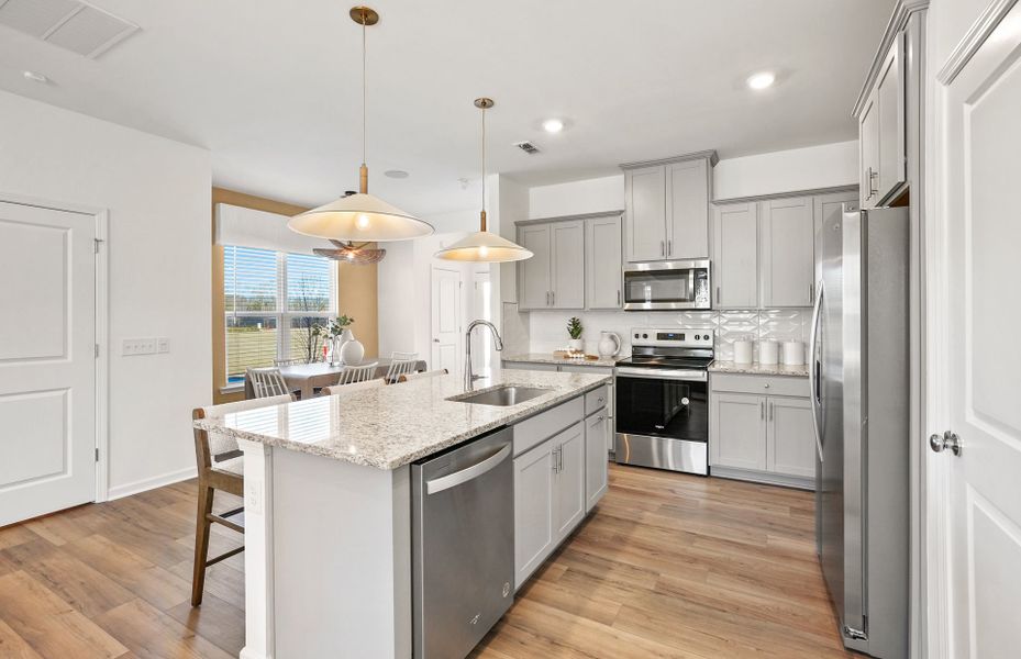 Furnished interior view inside a new home in Riverstone, Monroe (Image 7).