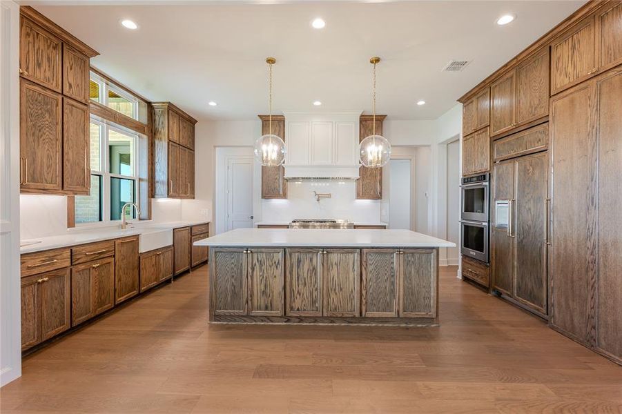 This kitchen offers so much storage with custom cabinets - soft close cabinets - what a plus! This kitchen offers so much storage with custom cabinets - soft close cabinets - what a plus!