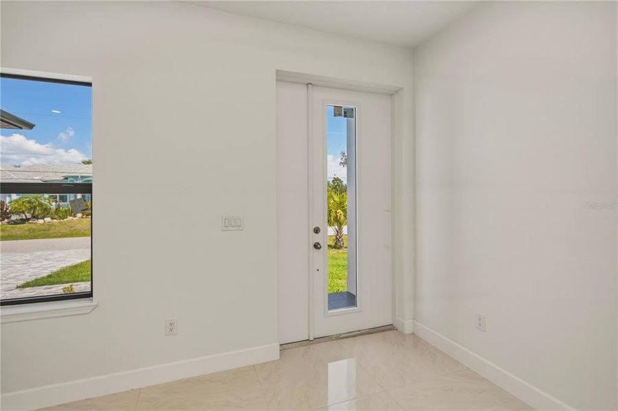 Spacious, unfurnished interior of a new home in , Port Charlotte (Image 38).