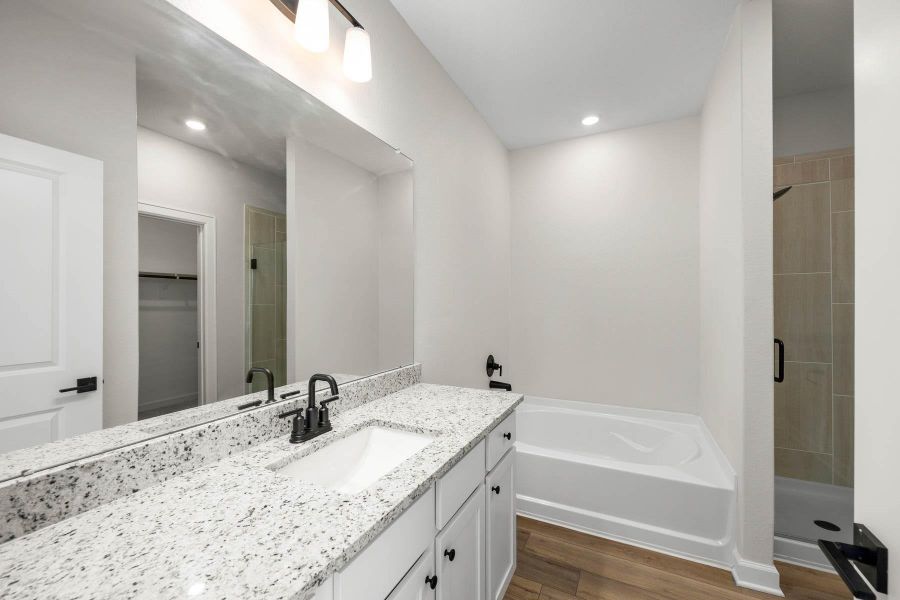 Furnished interior view inside a new home in Sunterra, Katy (Image 4).