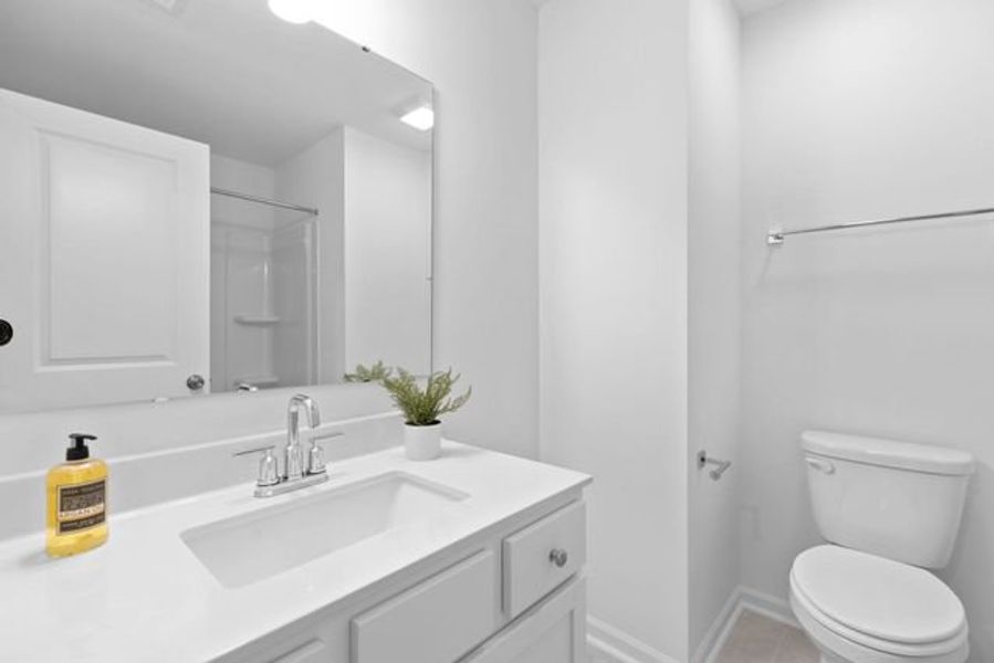 Representative furnished interior of a home built from the Alexandria TH by True Homes in Covington Ridge Townhomes, Thomasville (Image 17).