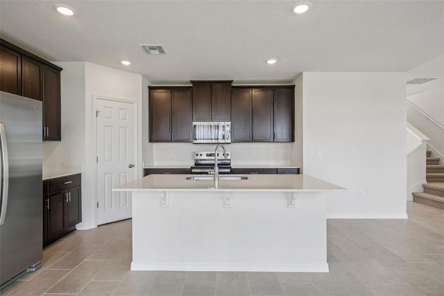 Furnished interior view inside a new home in Springs at Lake Alfred - Classic Series, Lake Alfred (Image 11).