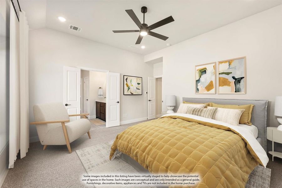 Bedroom with ceiling fan, carpet flooring, and open ensuite bathroom door
