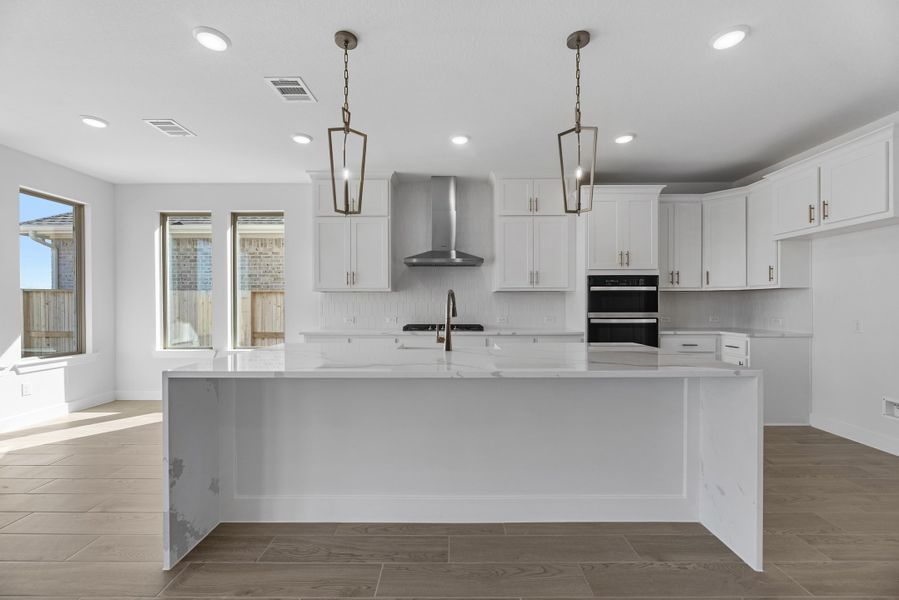 Furnished interior view inside a new home in Meridiana, Manvel (Image 6).