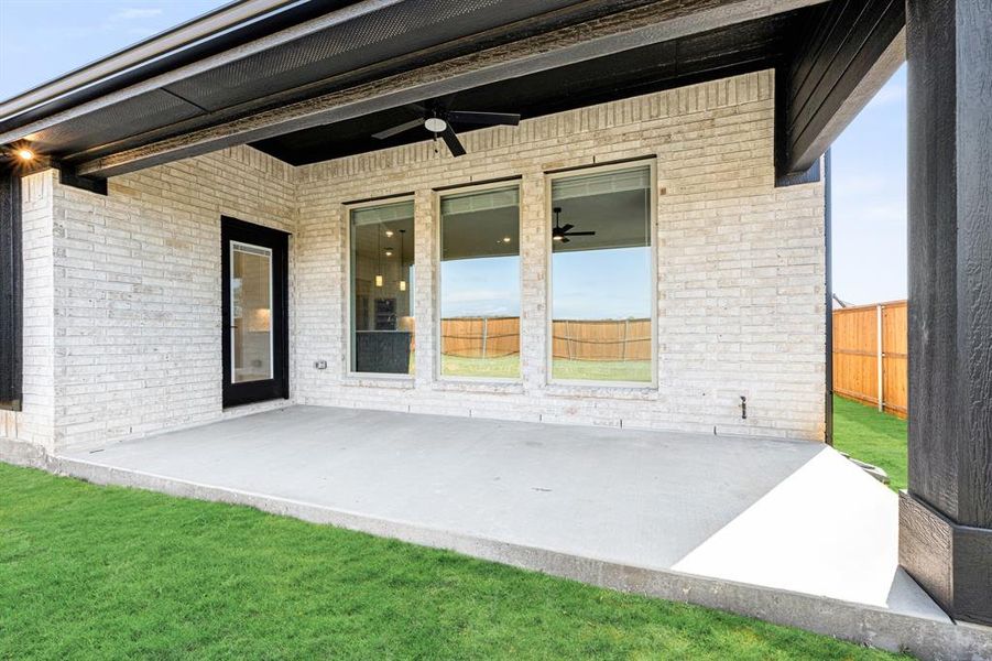 Exterior details and patio area of a home in Mockingbird Hills, Joshua (Image 21).